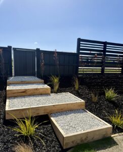 Raised timber gravel steps with native planting
